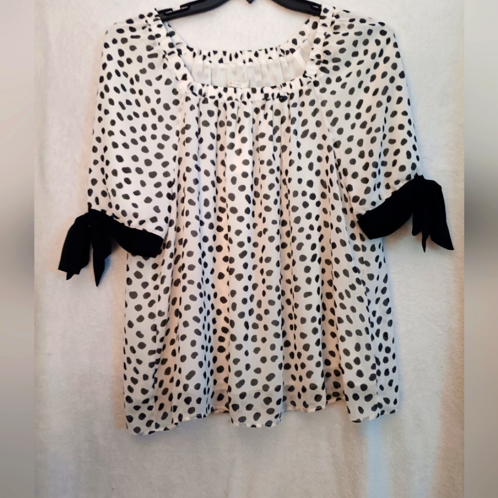NWT. Cato's black and white polka dot blouse. Size L.